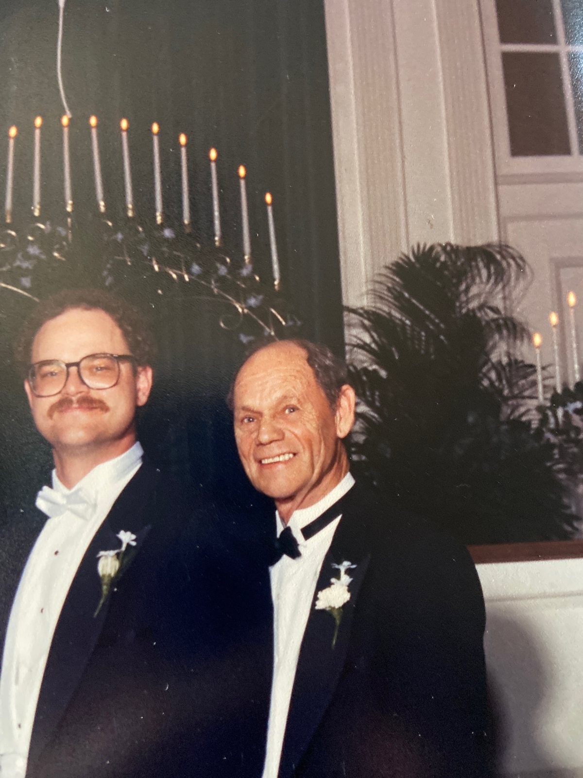 Two generations of the family in tuxedos — the trade passed down